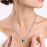 6x4 MM Oval Cut Emerald and 1/6 Ctw Round Cut Diamond Necklace in 14K White Gold
